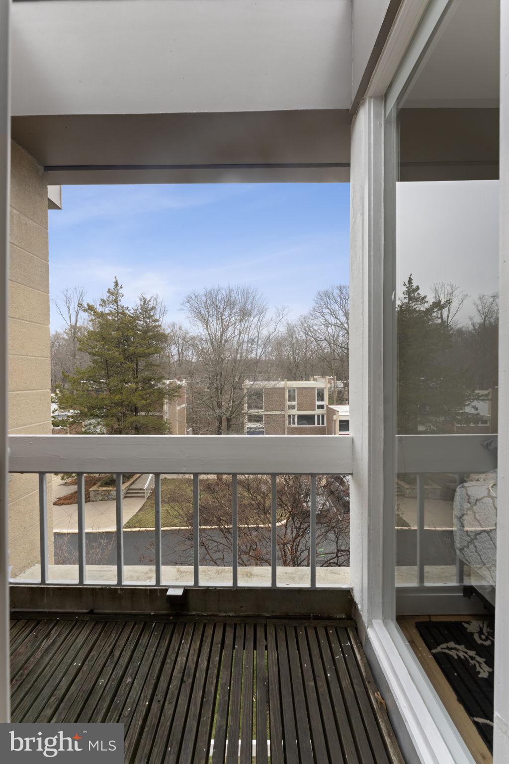 11587 Maple Ridge Road Reston, VA 20190 - Photo 73 of 119 a view of a balcony with wooden floor