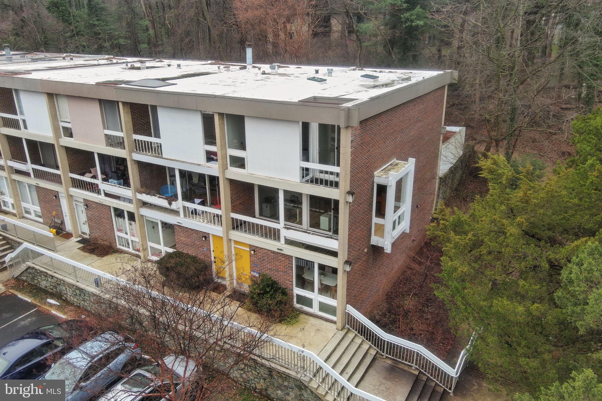 11587 Maple Ridge Road Reston, VA 20190 - Photo 88 of 119 a view of a house with a sink and wooden fence