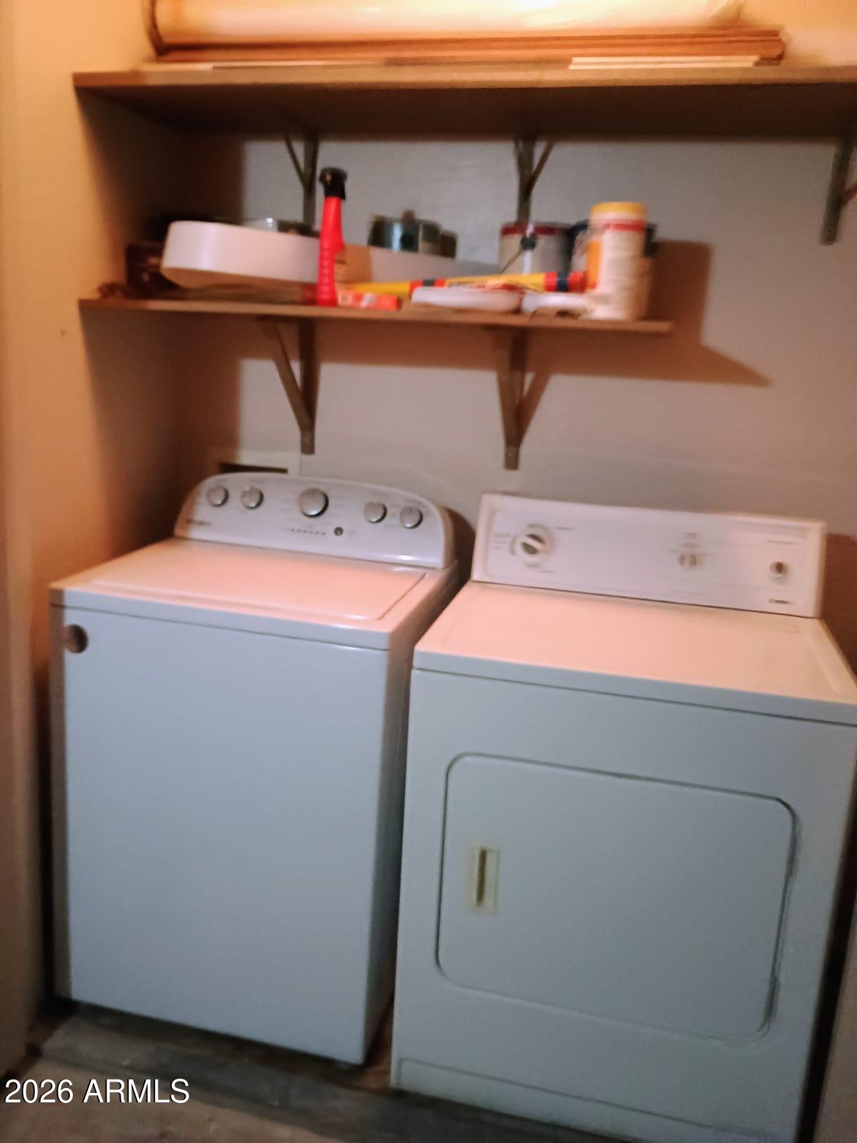 1287 North Alma School Road, Unit 259 Chandler, AZ 85224 - Photo 19 of 22 a utility room with dryer and washer
