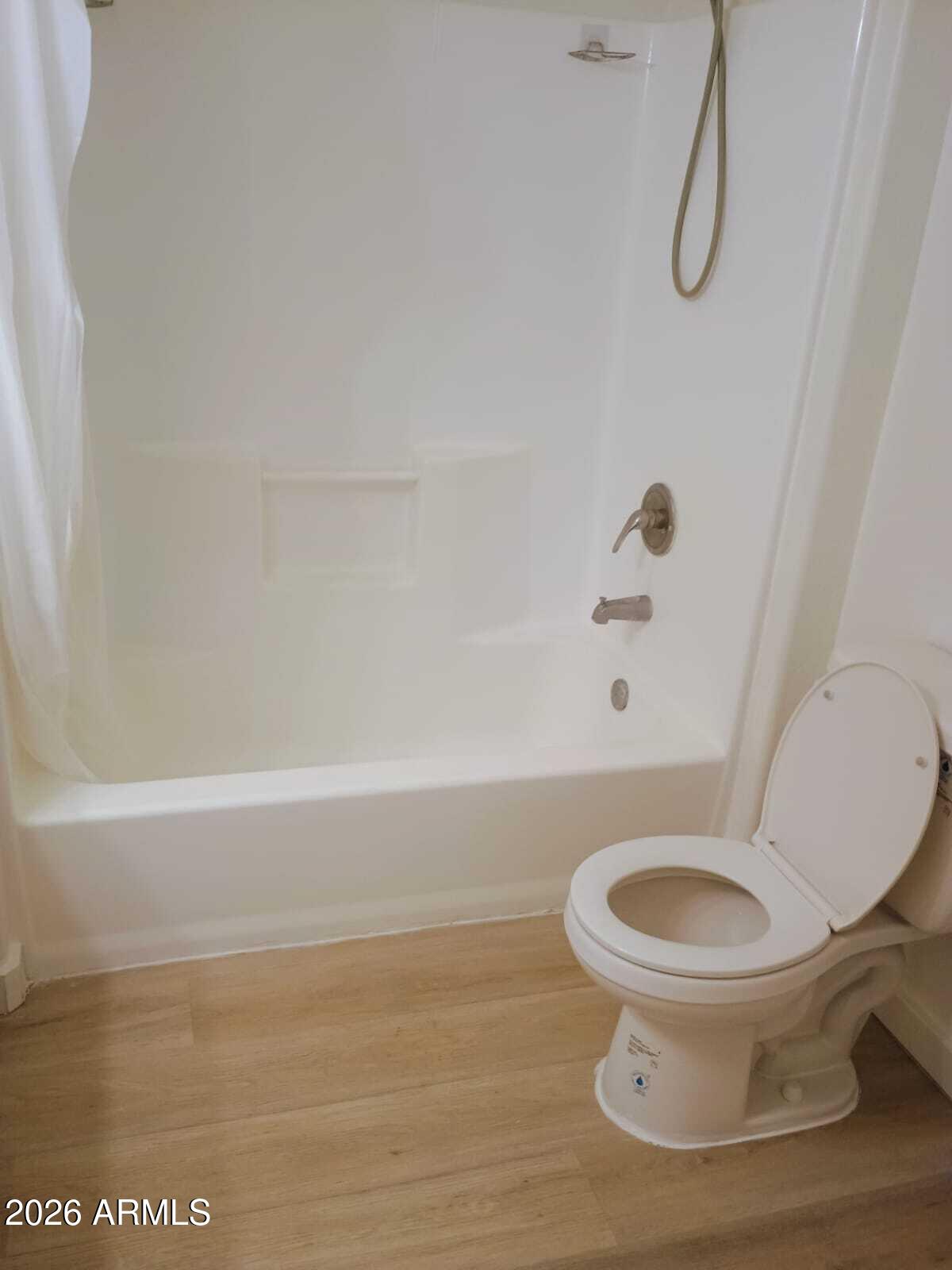 1287 North Alma School Road, Unit 259 Chandler, AZ 85224 - Photo 9 of 22 a bathroom with a toilet and a shower