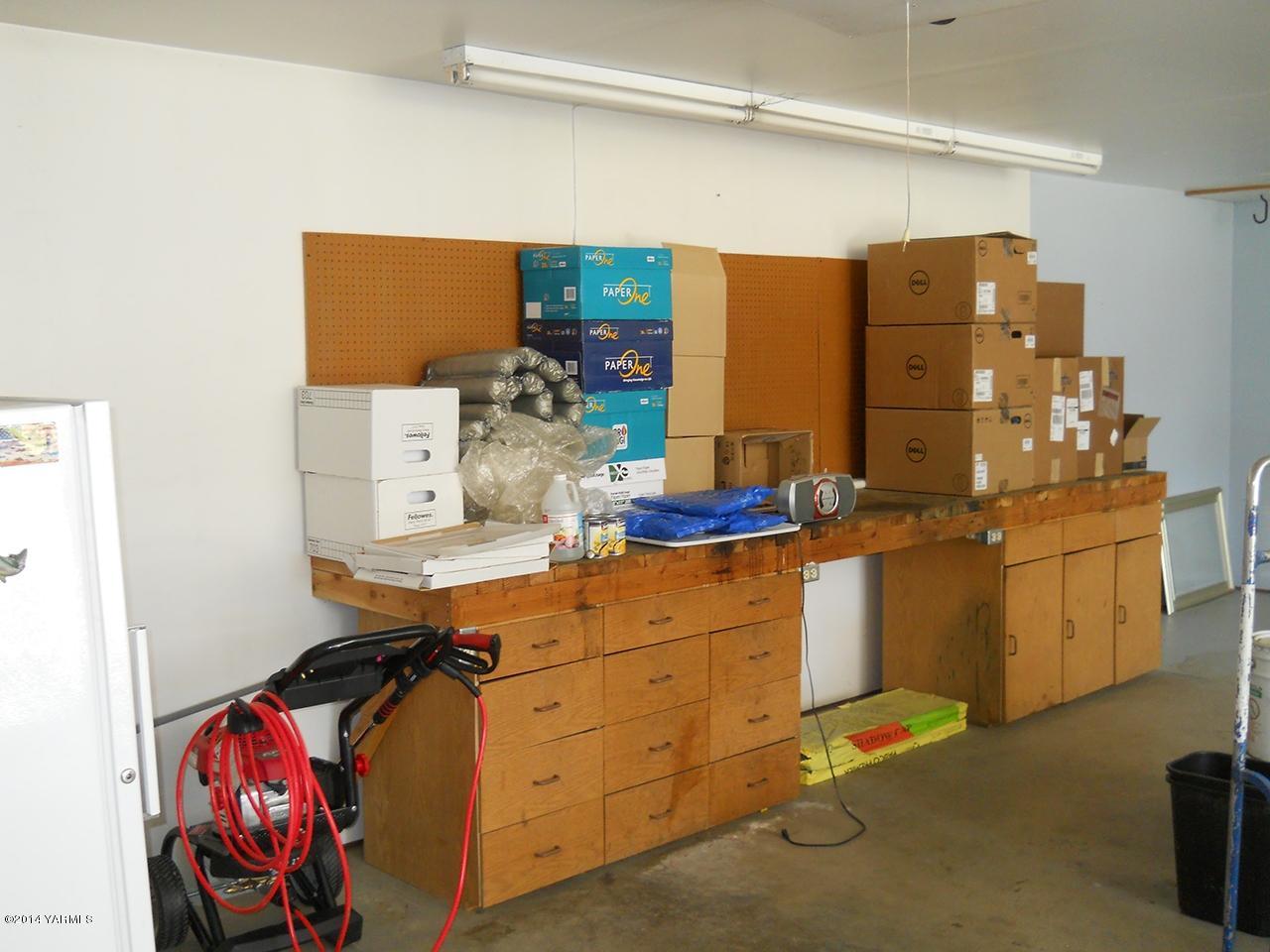 15601 Fisk Road Yakima, WA 98908 - Photo 45 of 58 Workbench Area at Front of Garage