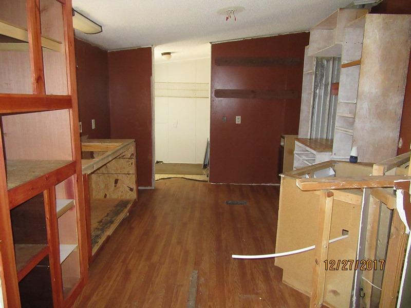 2408 Graham Cemetery Road Clarksville, TN 37043 - Photo 3 of 7 a view of a kitchen from a hallway
