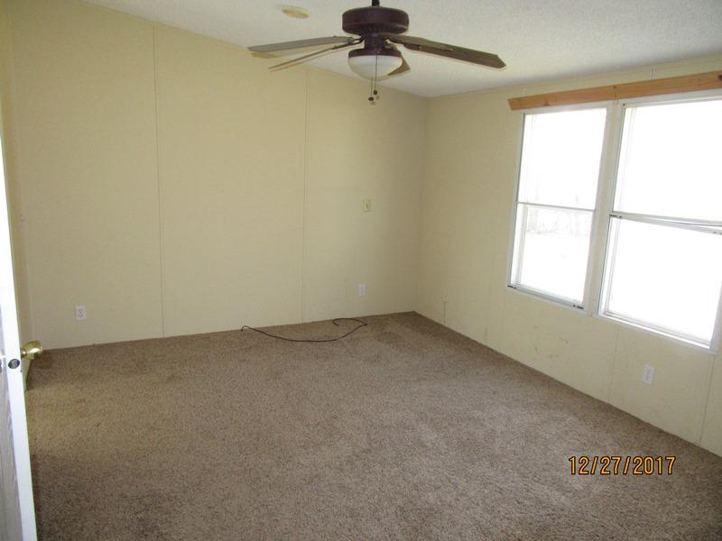 2408 Graham Cemetery Road Clarksville, TN 37043 - Photo 5 of 7 an empty room with a window