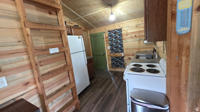 5782 Pineview Loop, Unit 921 Kamas, UT 84036 - Photo 6 of 29 Compact kitchen featuring wood-finish flooring, wood plank walls, and a wood plank ceiling