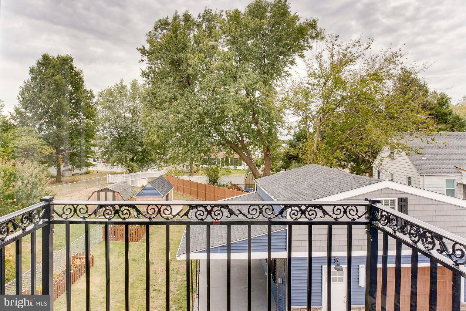 603 Seena Road Baltimore, MD 21221 - Photo 48 of 49 Cantilevered trex decking/aluminum rail balcony