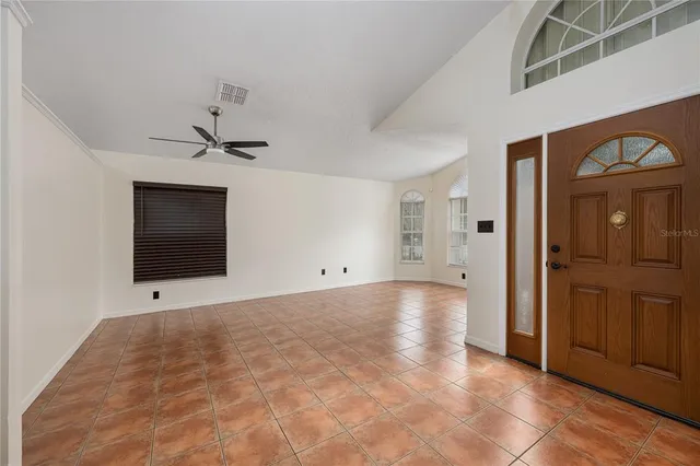 a view of an empty room with a bathroom