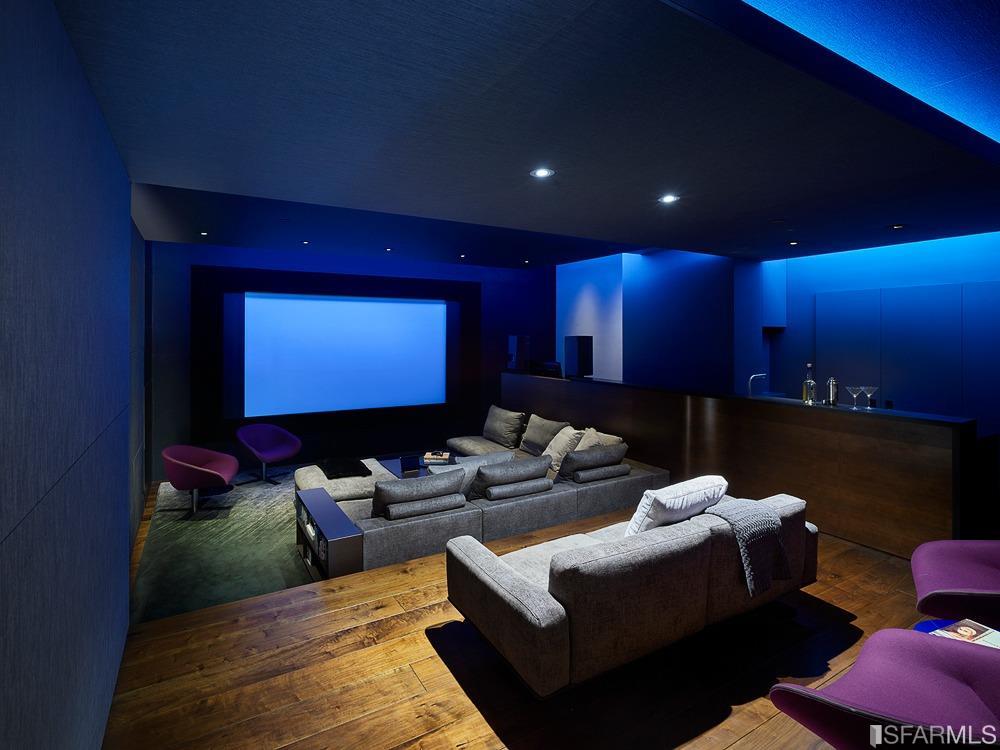 2626 Filbert Street San Francisco, CA 94123 - Photo 7 of 8 a media room with lots of chairs and a projector screen