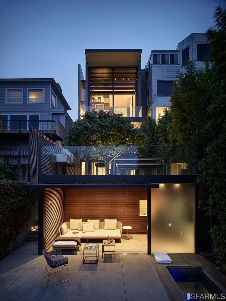 2626 Filbert Street San Francisco, CA 94123 - Photo 8 of 8 a living room with furniture a window and potted plants
