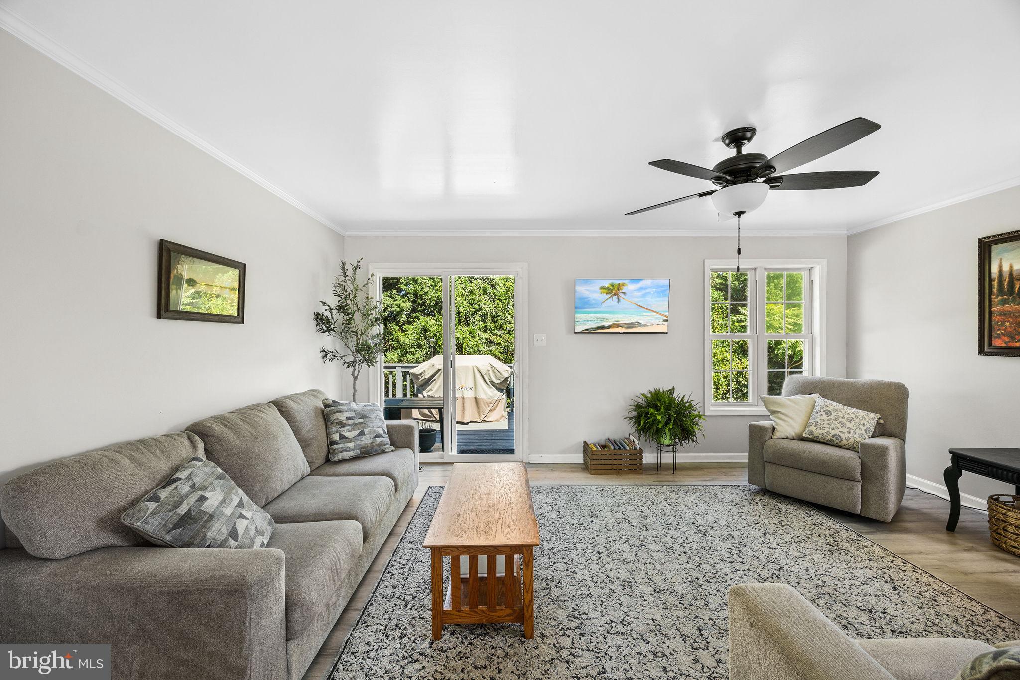60 Trix Court Ranson, WV 25438 - Photo 17 of 47 a living room with furniture ceiling fan and a window