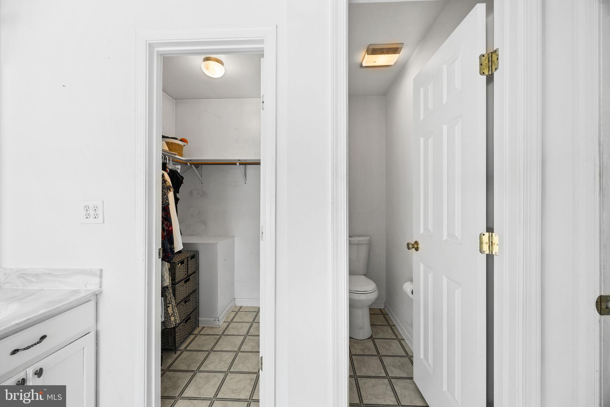 60 Trix Court Ranson, WV 25438 - Photo 26 of 47 a view of a bathroom from a hallway
