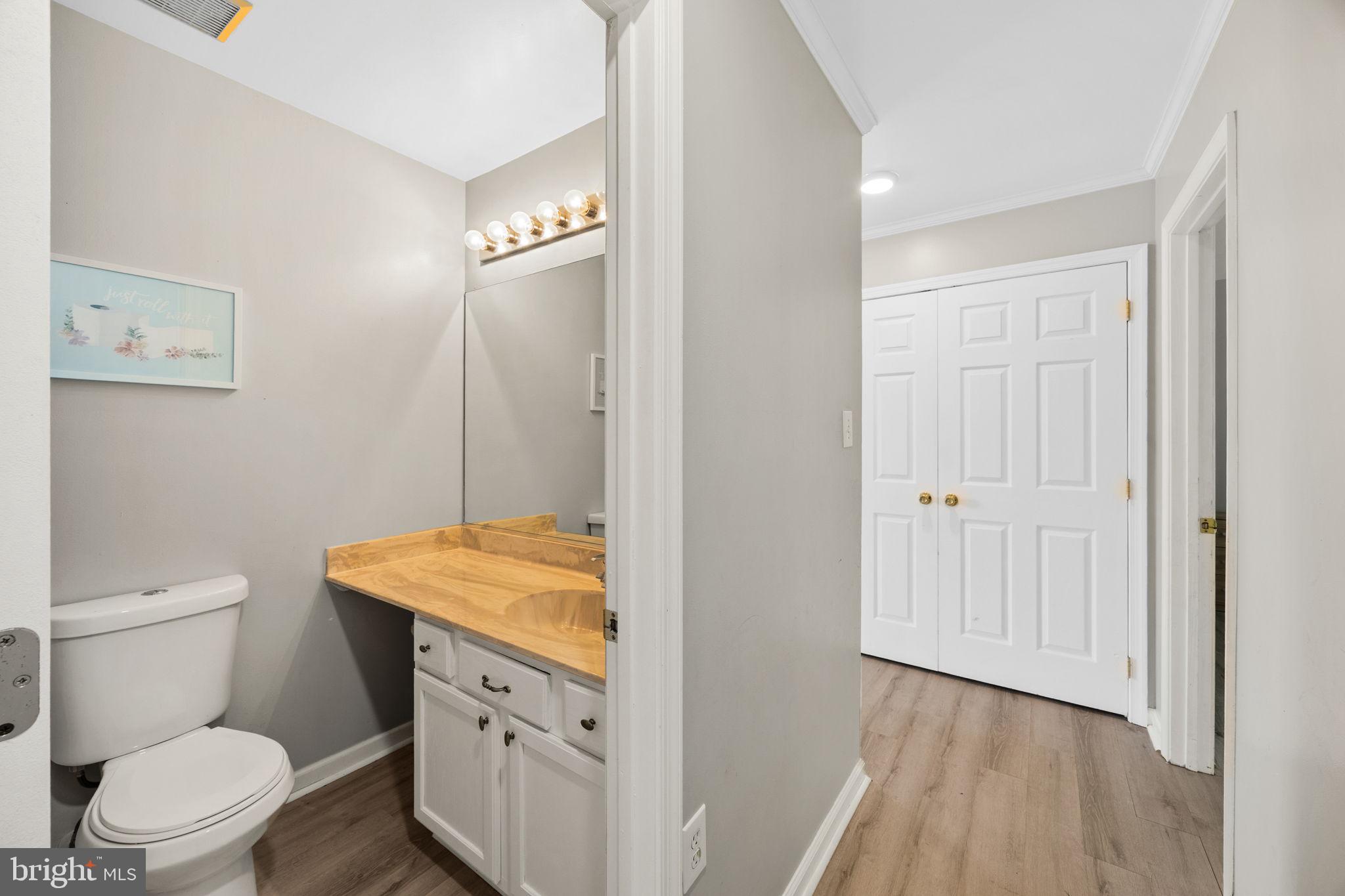 60 Trix Court Ranson, WV 25438 - Photo 30 of 47 a bathroom with a granite countertop sink toilet and shower