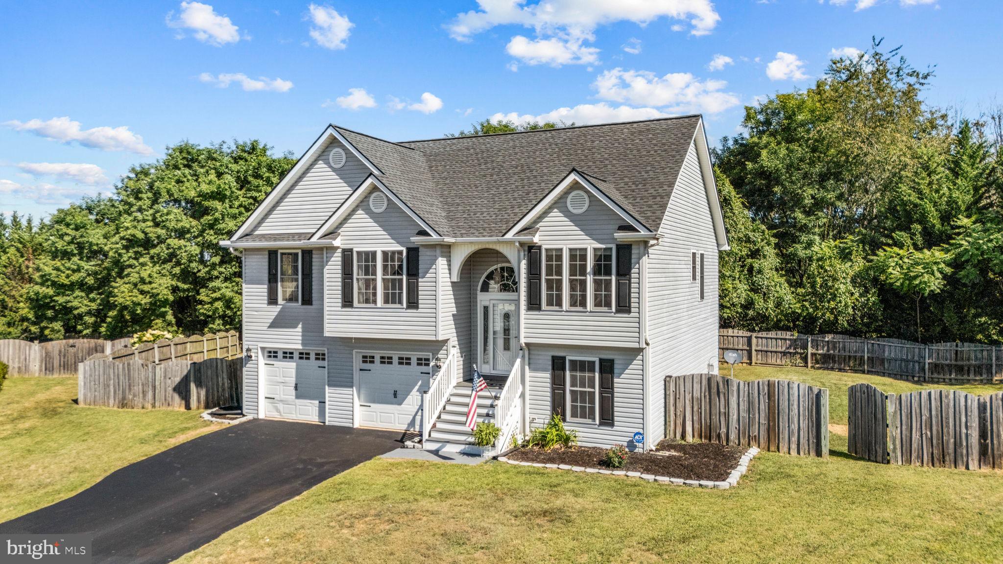 60 Trix Court Ranson, WV 25438 - Photo 3 of 47 front view of house with a yard