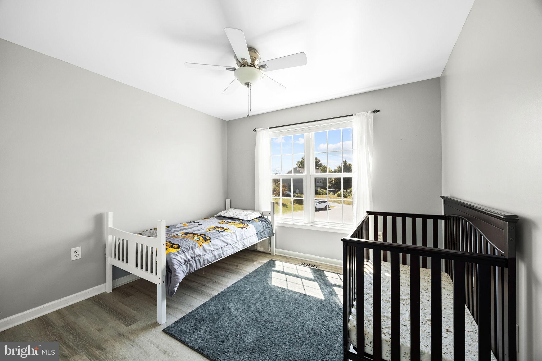 60 Trix Court Ranson, WV 25438 - Photo 36 of 47 a bedroom with furniture and a window