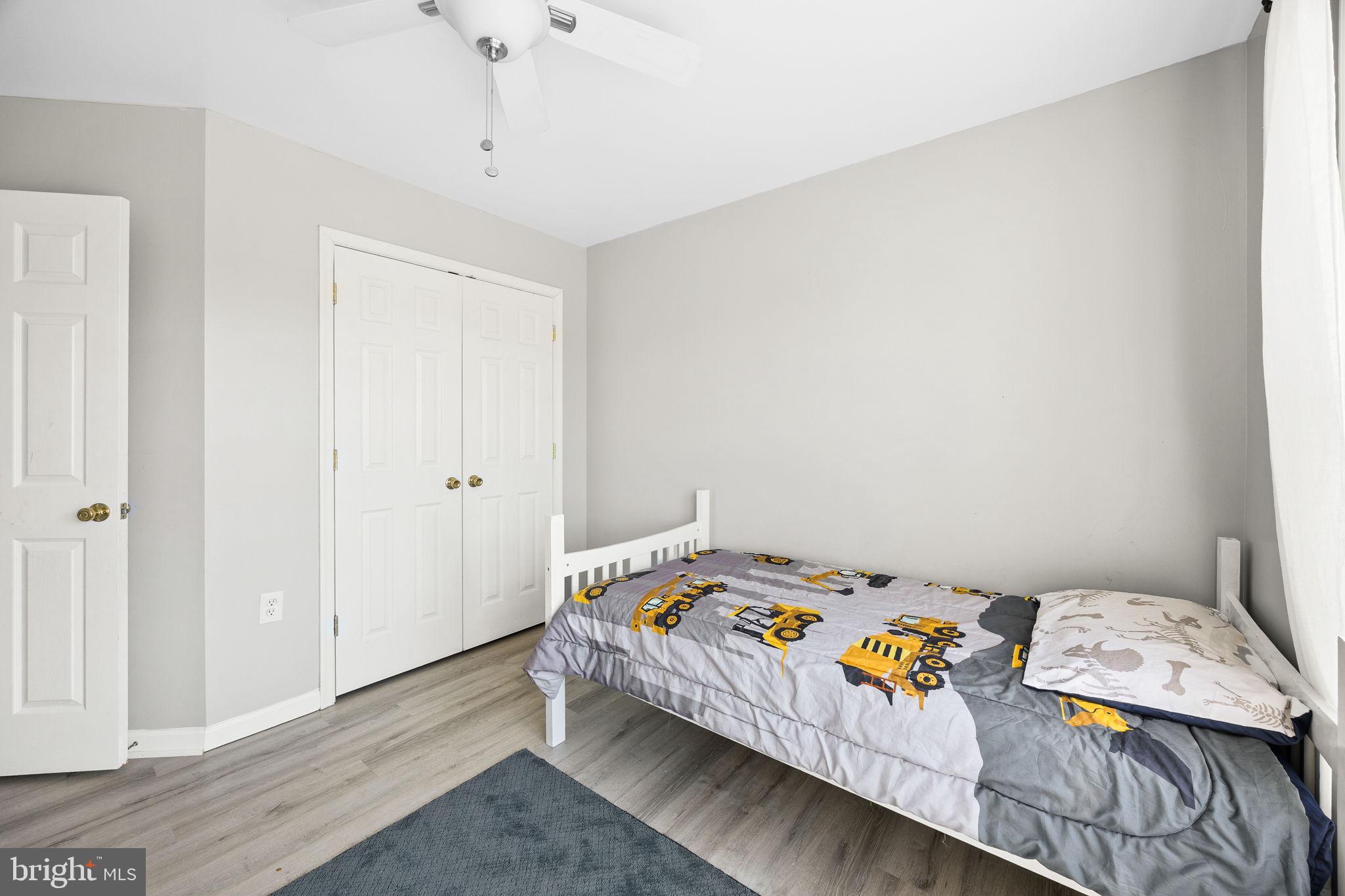 60 Trix Court Ranson, WV 25438 - Photo 37 of 47 a bedroom with a bed and a window