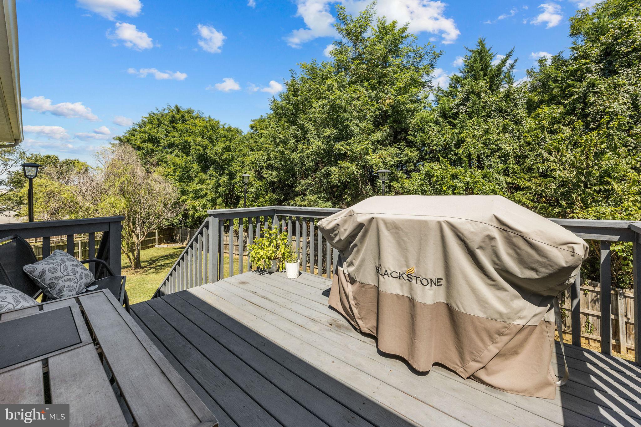 60 Trix Court Ranson, WV 25438 - Photo 47 of 47 a view of a balcony with wooden floor and outdoor seating