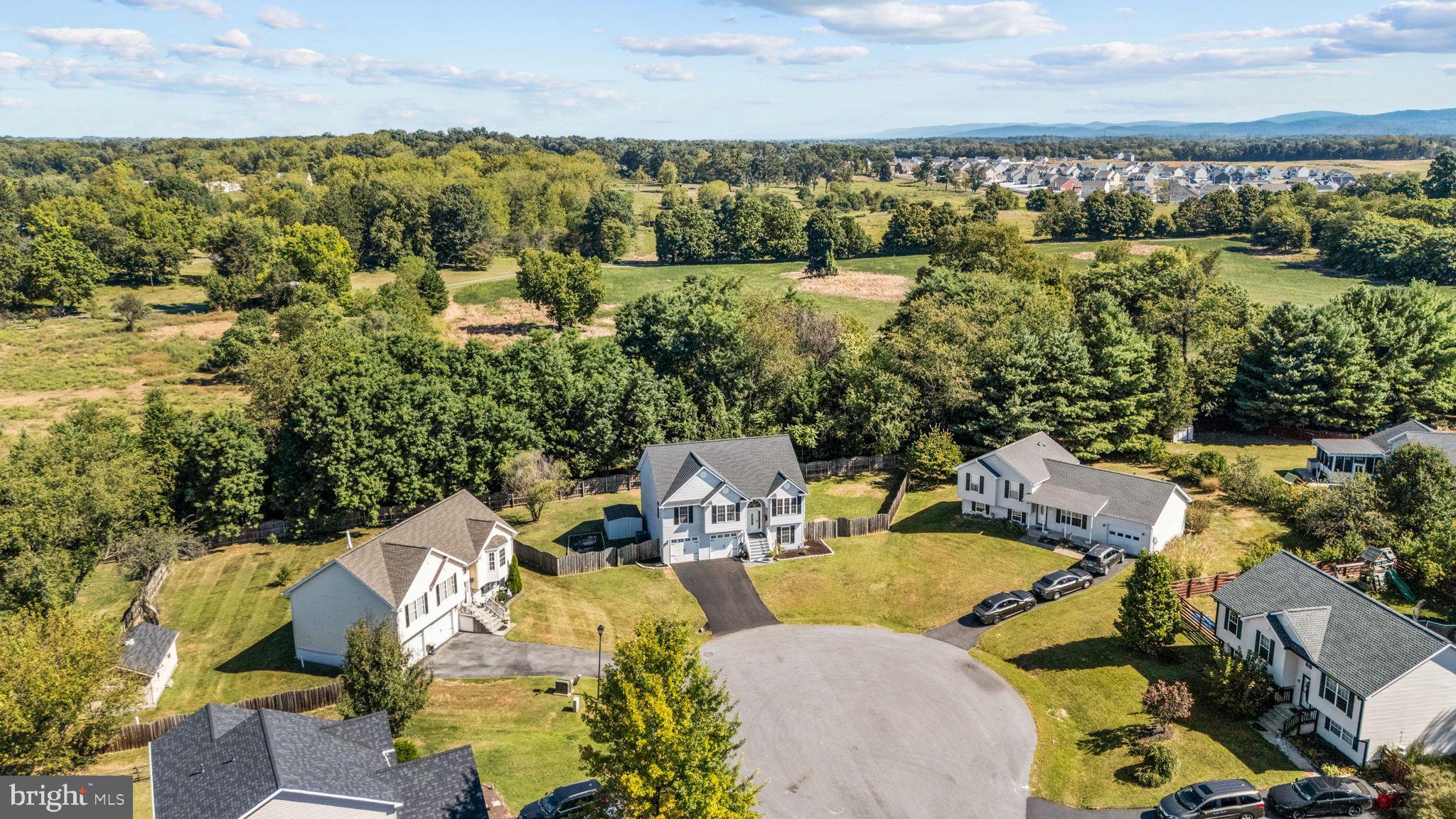 60 Trix Court Ranson, WV 25438 - Photo 5 of 47 an aerial view of a house with a lake view