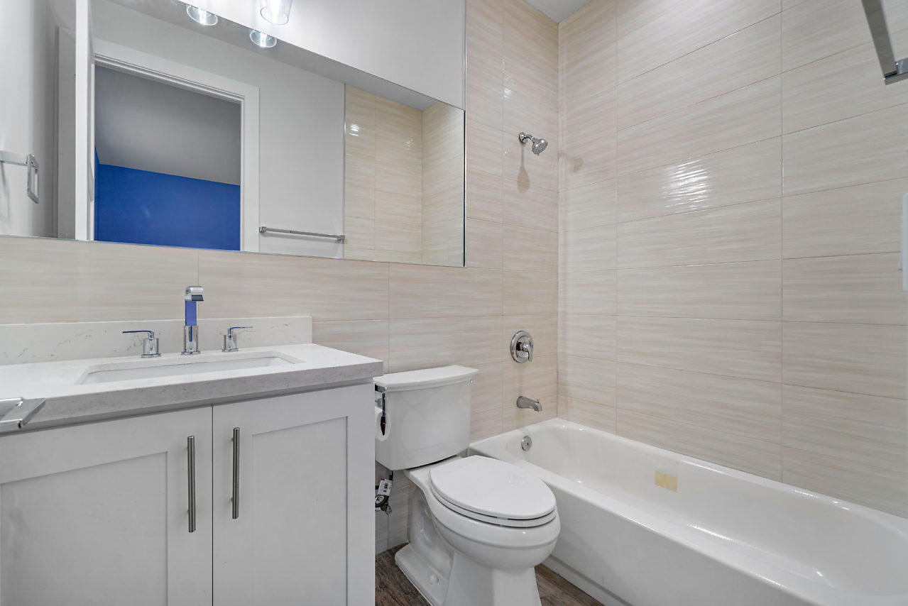 21311 Falls Ridge Way Boca Raton, FL 33428 - Photo 27 of 56 a bathroom with a sink toilet and shower