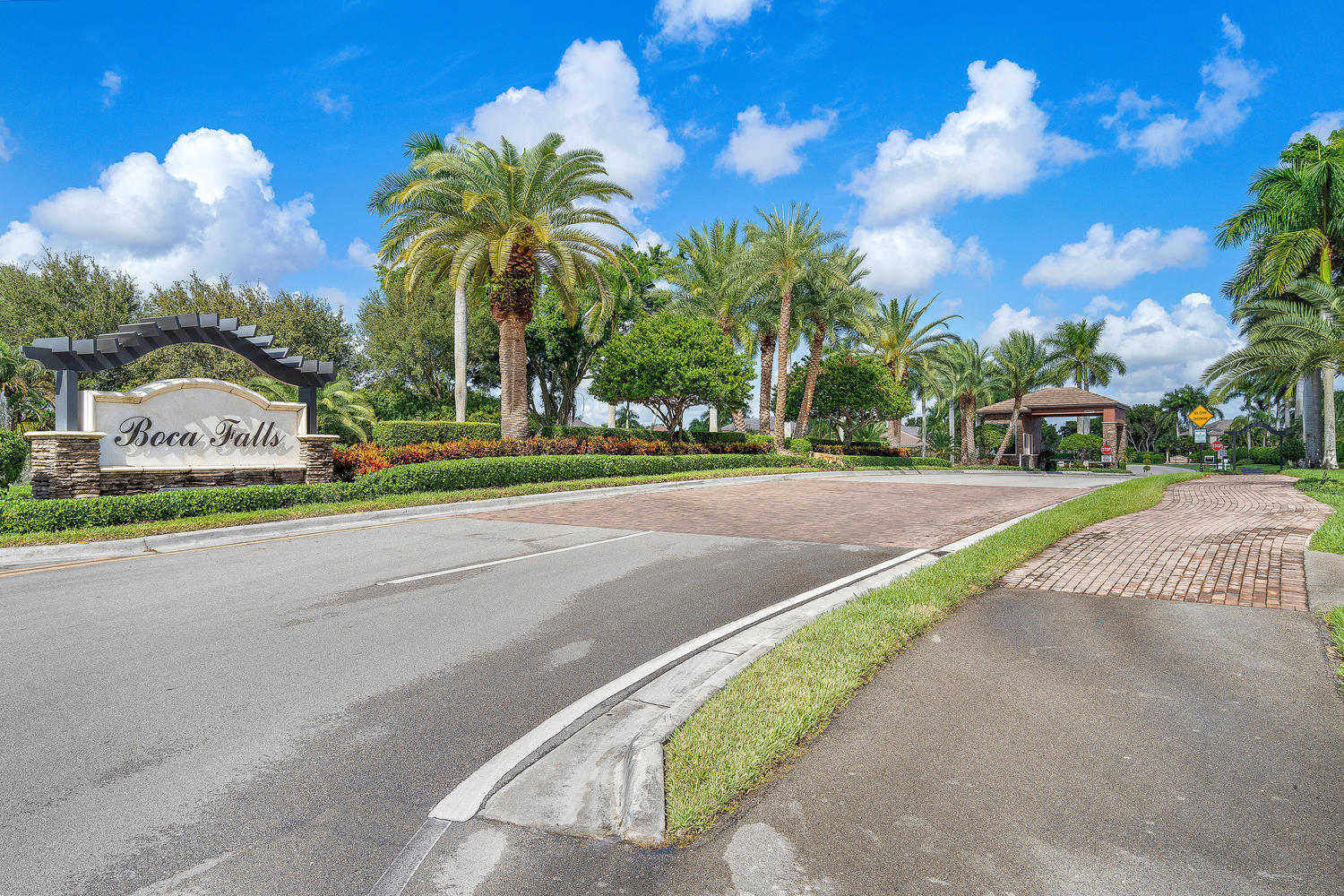 21311 Falls Ridge Way Boca Raton, FL 33428 - Photo 54 of 56 a view of a street with houses