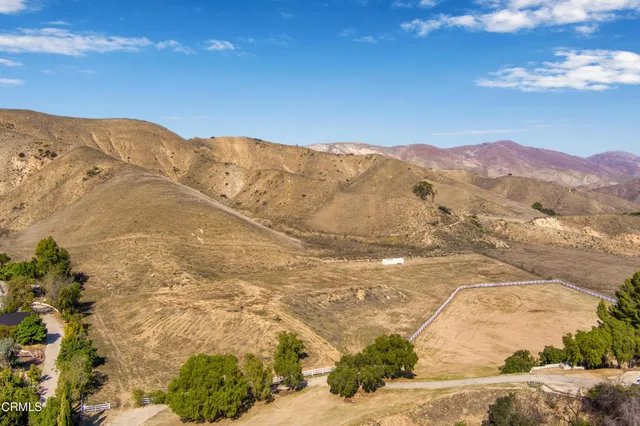 a view of ocean and mountains