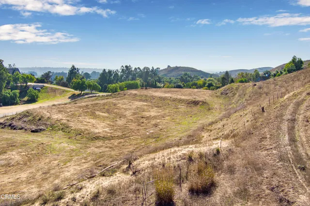 a view of a backyard of a house