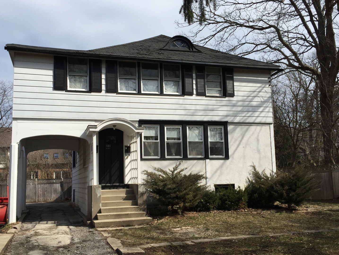 1151 Chatfield Road Winnetka, IL 60093 - Photo 1 of 1 a front view of a house with garden