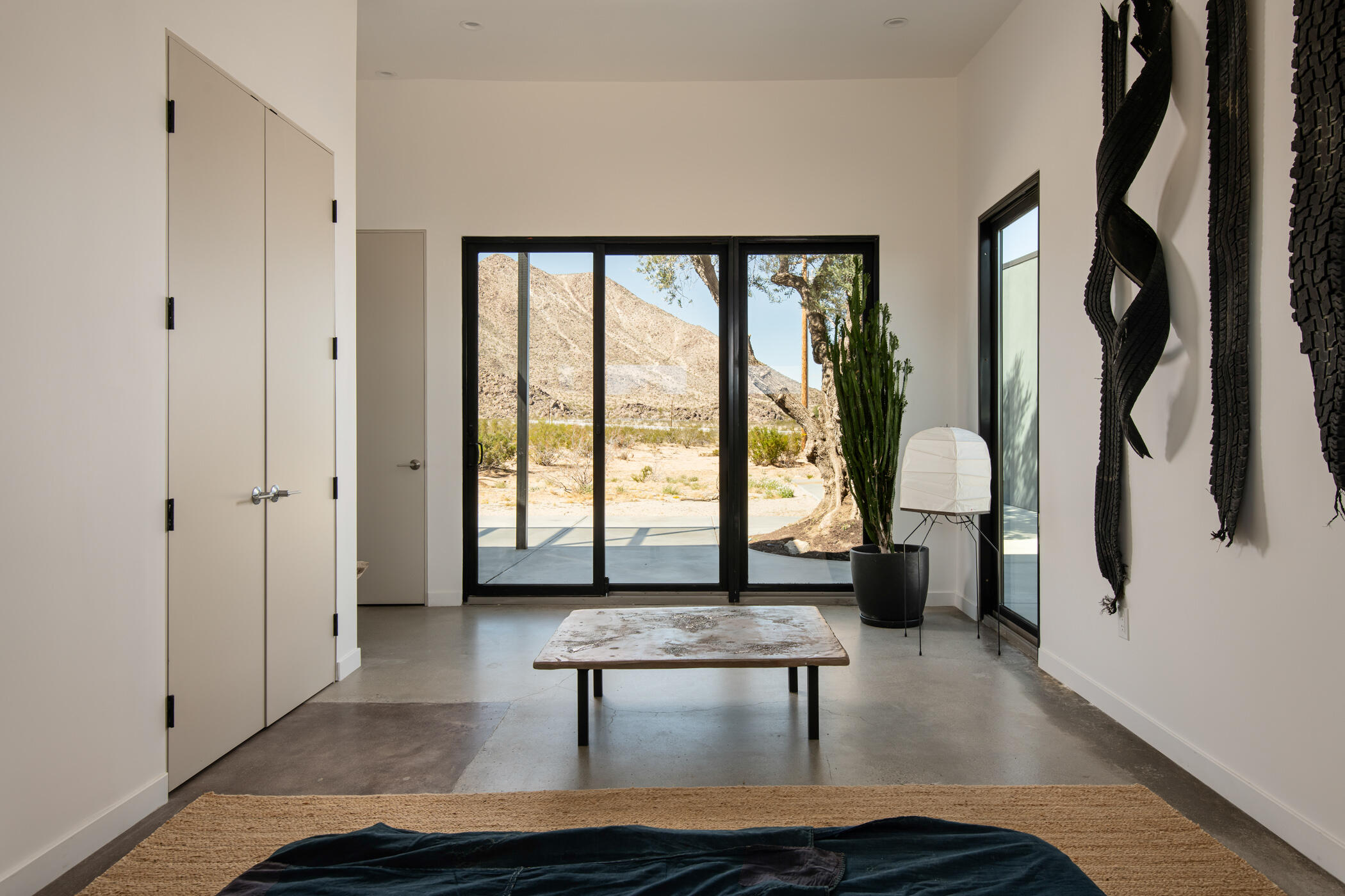 60052 Rocky Road Landers, CA 92285 - Photo 16 of 42 a living room with furniture and large window