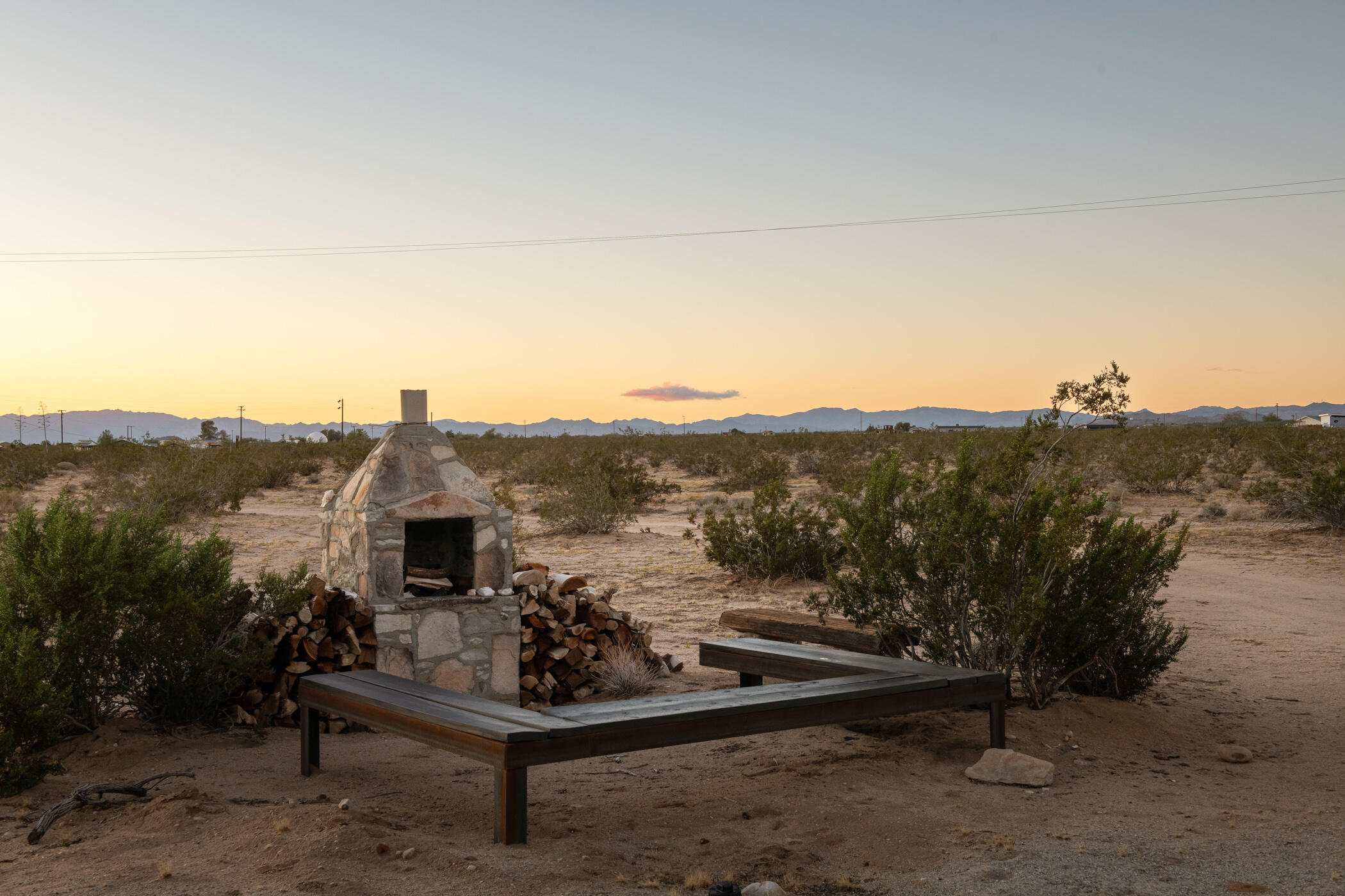 60052 Rocky Road Landers, CA 92285 - Photo 33 of 42 a view of a terrace with a yard