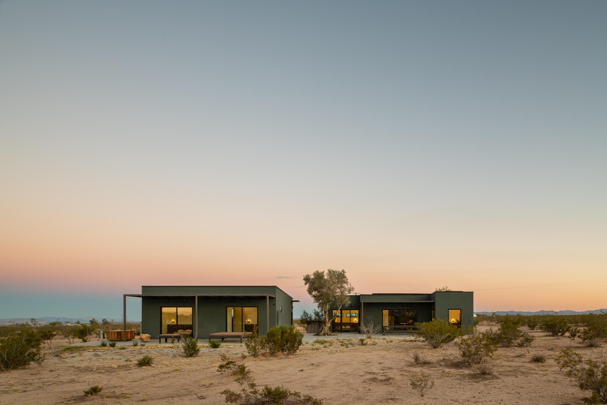 60052 Rocky Road Landers, CA 92285 - Photo 37 of 42 a view of a car parked in front of a house