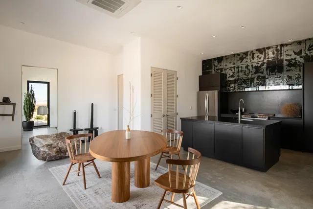 a workspace with furniture and window