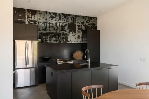 a workspace with furniture and window