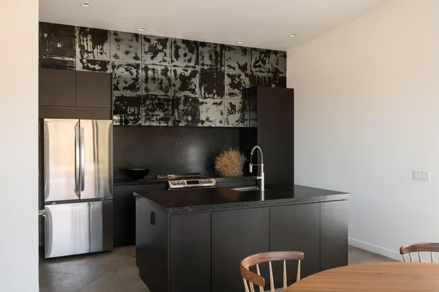 a workspace with furniture and window