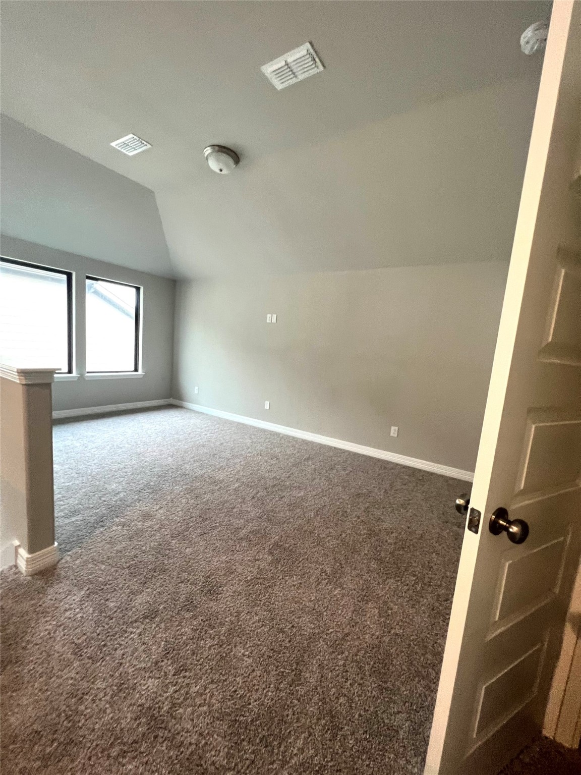 24239 Maple Summit Lane Katy, TX 77494 - Photo 12 of 17 an empty room with windows