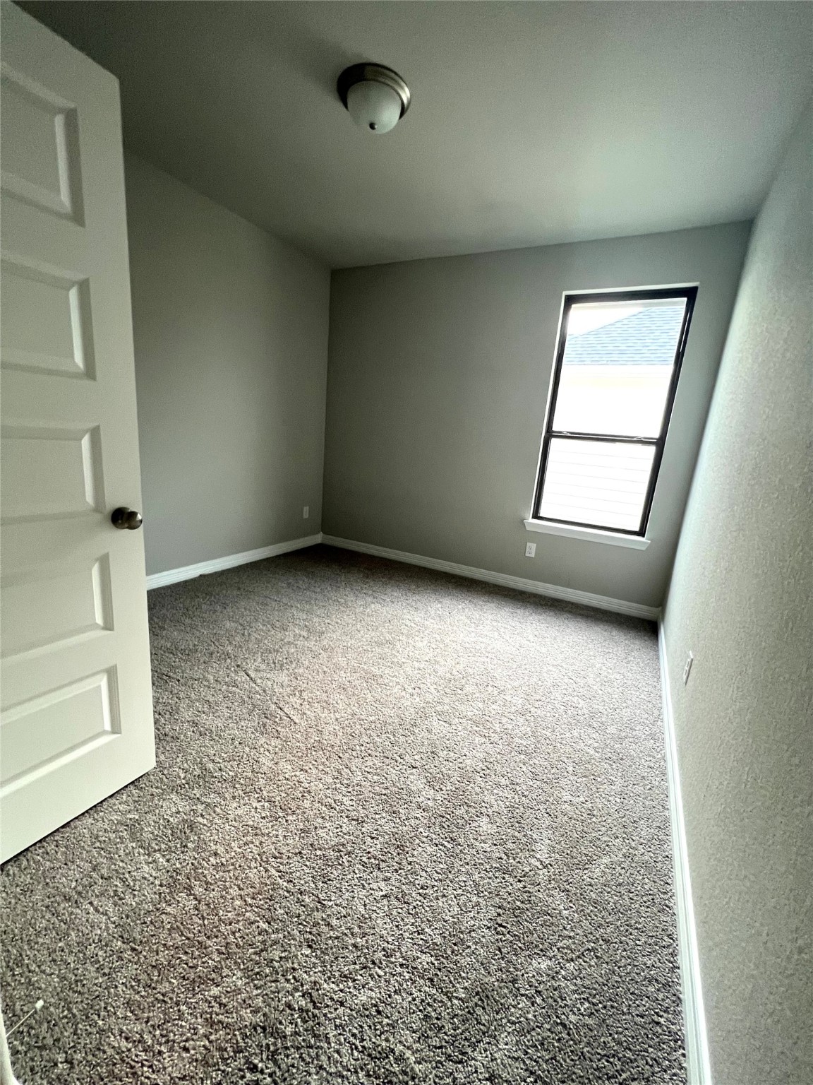 24239 Maple Summit Lane Katy, TX 77494 - Photo 13 of 17 an empty room with windows
