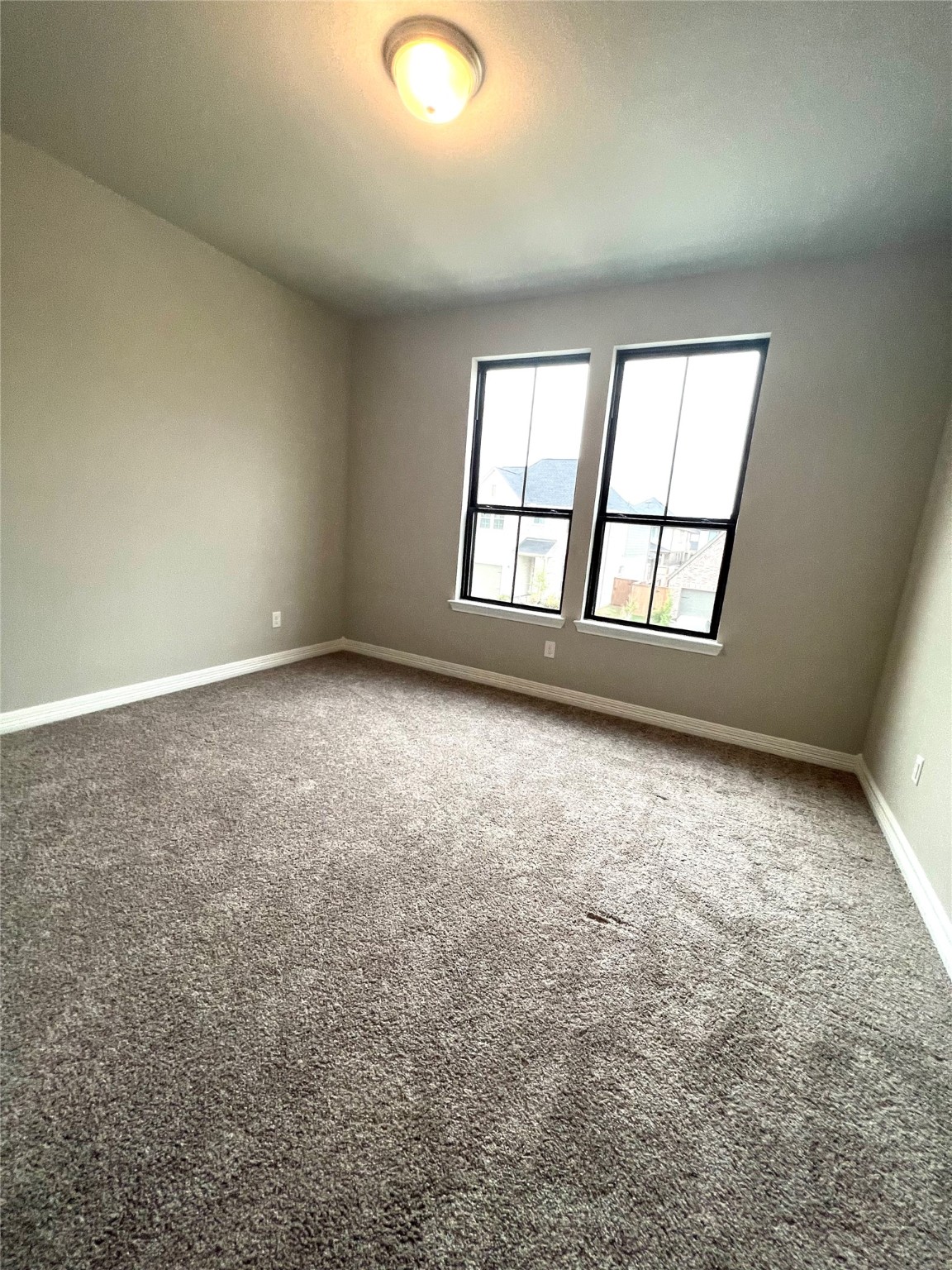 24239 Maple Summit Lane Katy, TX 77494 - Photo 16 of 17 an empty room with windows