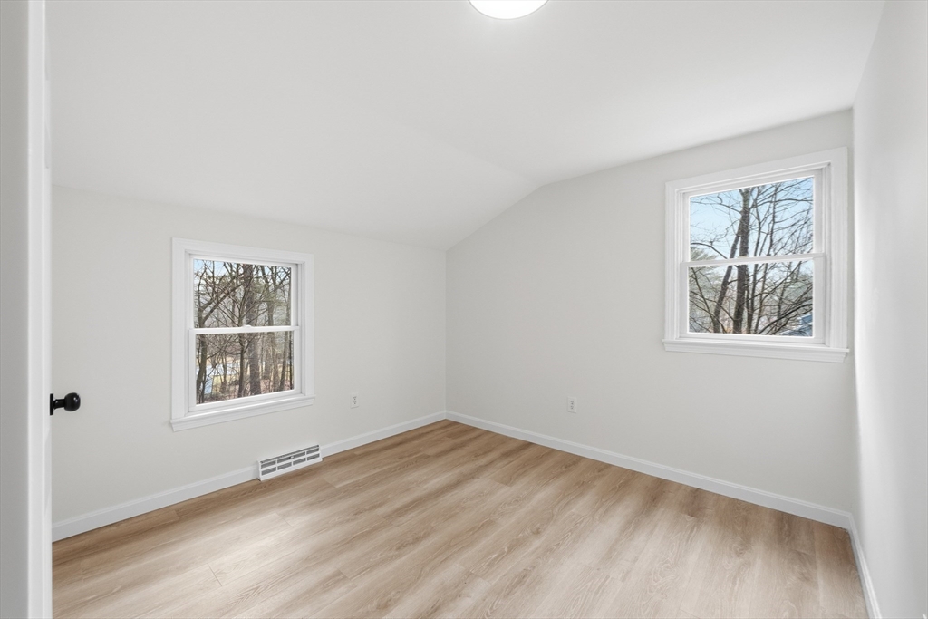 18 Emery Road Townsend, MA 01469 - Photo 12 of 18 wooden floor in an empty room with a window