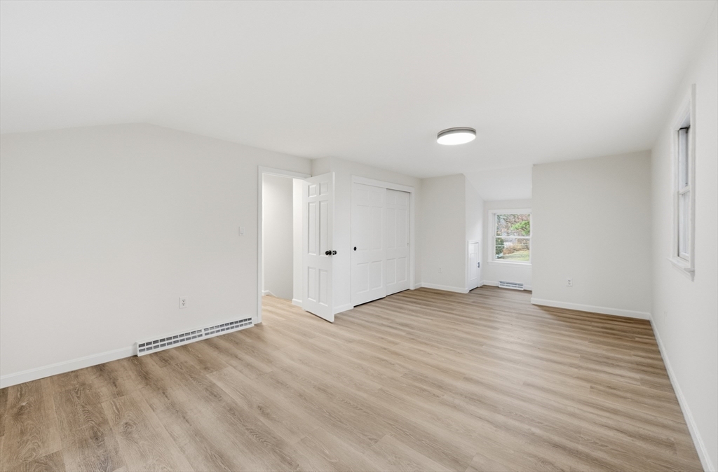 18 Emery Road Townsend, MA 01469 - Photo 13 of 18 a view of an empty room with wooden floor and a window
