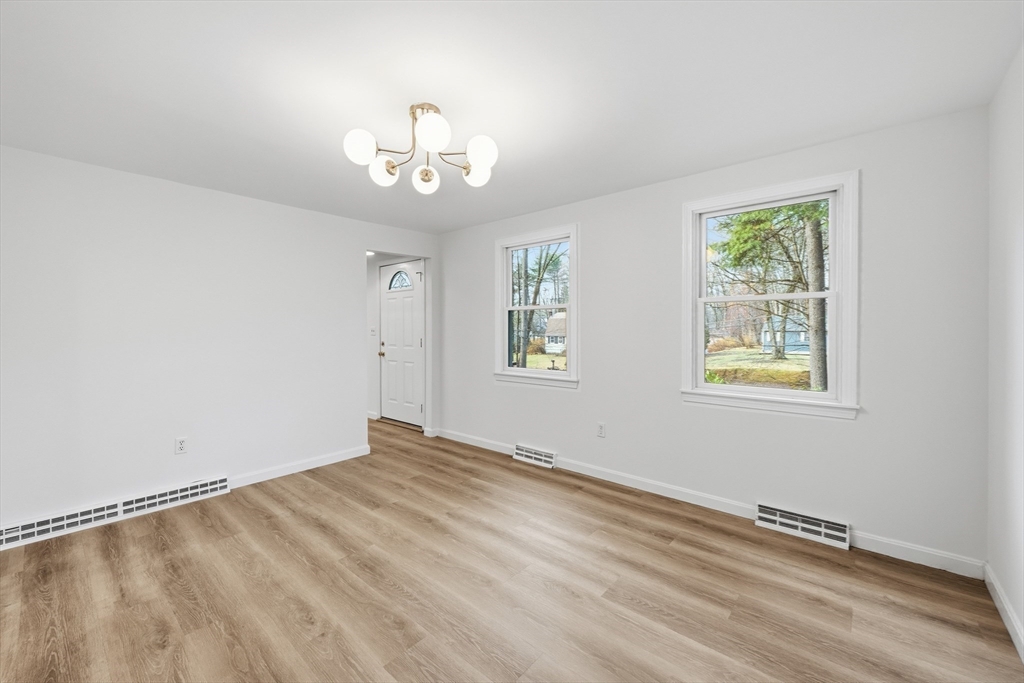 18 Emery Road Townsend, MA 01469 - Photo 5 of 18 a view of an empty room with a window