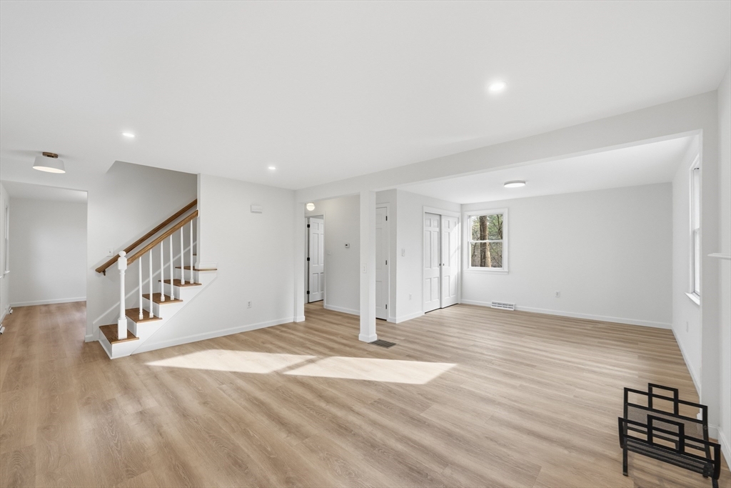 18 Emery Road Townsend, MA 01469 - Photo 7 of 18 a view of an empty room with stairs