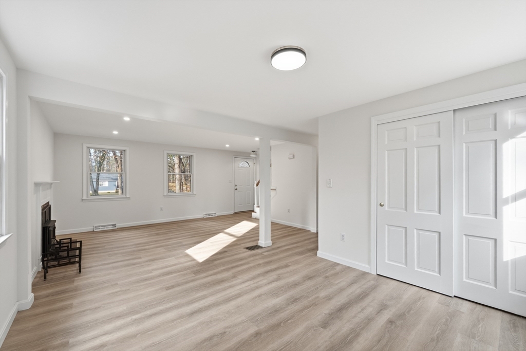 18 Emery Road Townsend, MA 01469 - Photo 9 of 18 a view of empty room with wooden floor