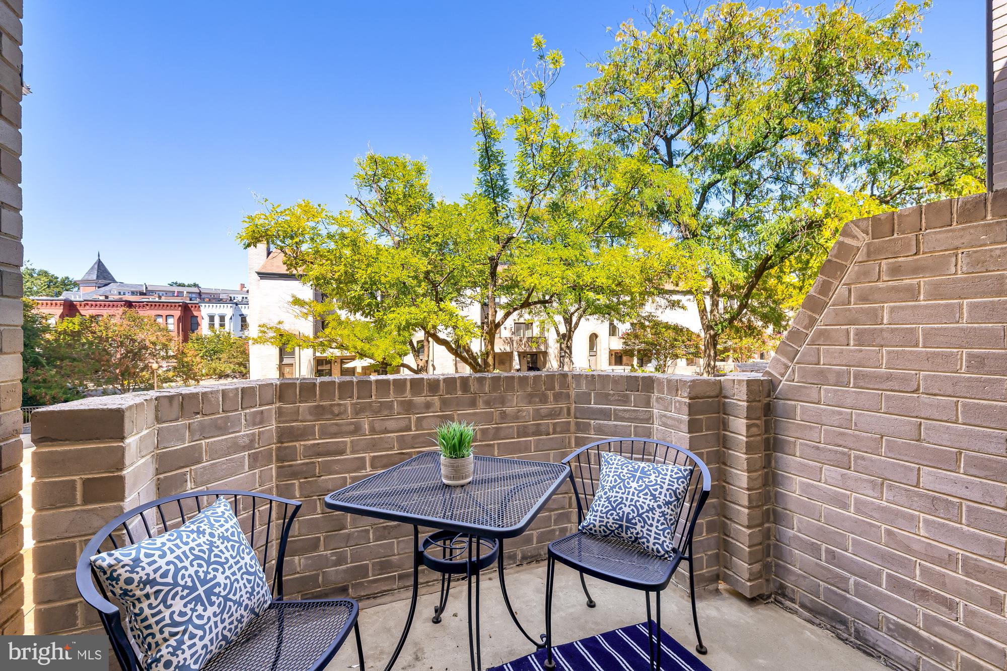 1325 13th Street Northwest, Unit 47 Washington, DC 20005 - Photo 2 of 35 Private balcony overlooking lush courtyard garden
