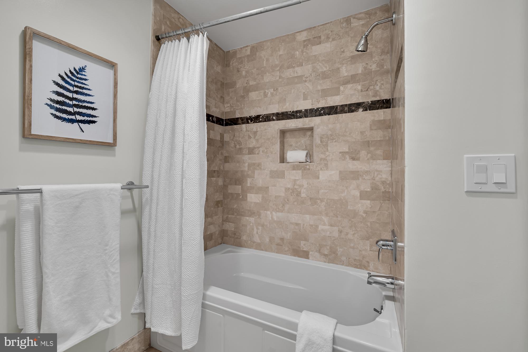 1325 13th Street Northwest, Unit 47 Washington, DC 20005 - Photo 26 of 35 Second full bath with deep soaking tub and shower