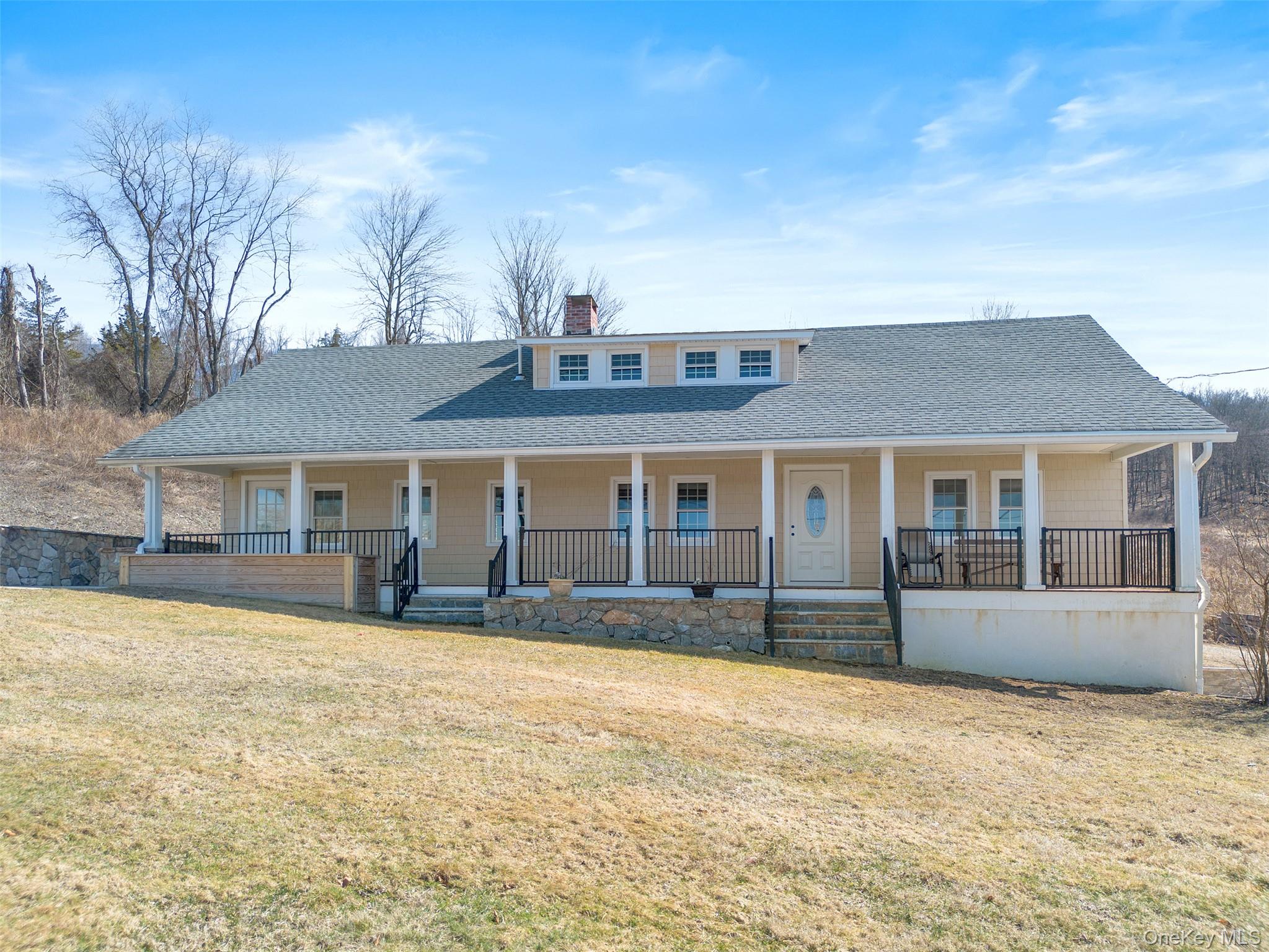 70 Barmore Road LaGrangeville, NY 12540 - Photo 2 of 47 Country-style home featuring covered porch, roof with shingles, and a chimney