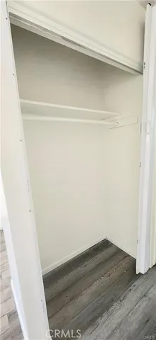 a view of small space with wooden floor