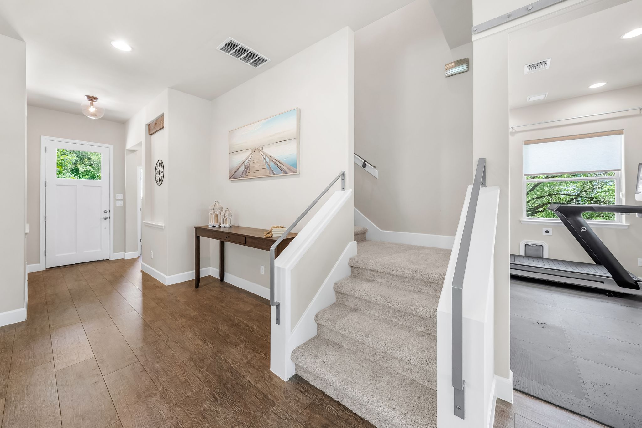 14213 Red Feather Trail Austin, TX 78734 - Photo 6 of 39 a view of entryway with bedroom and wooden floor