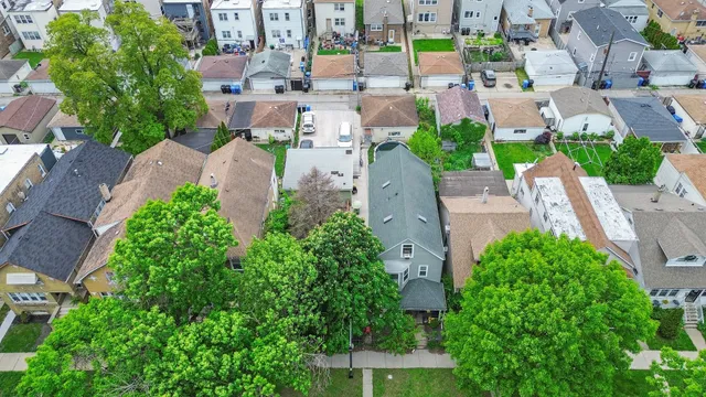 an aerial view of a city with lots of residential buildings