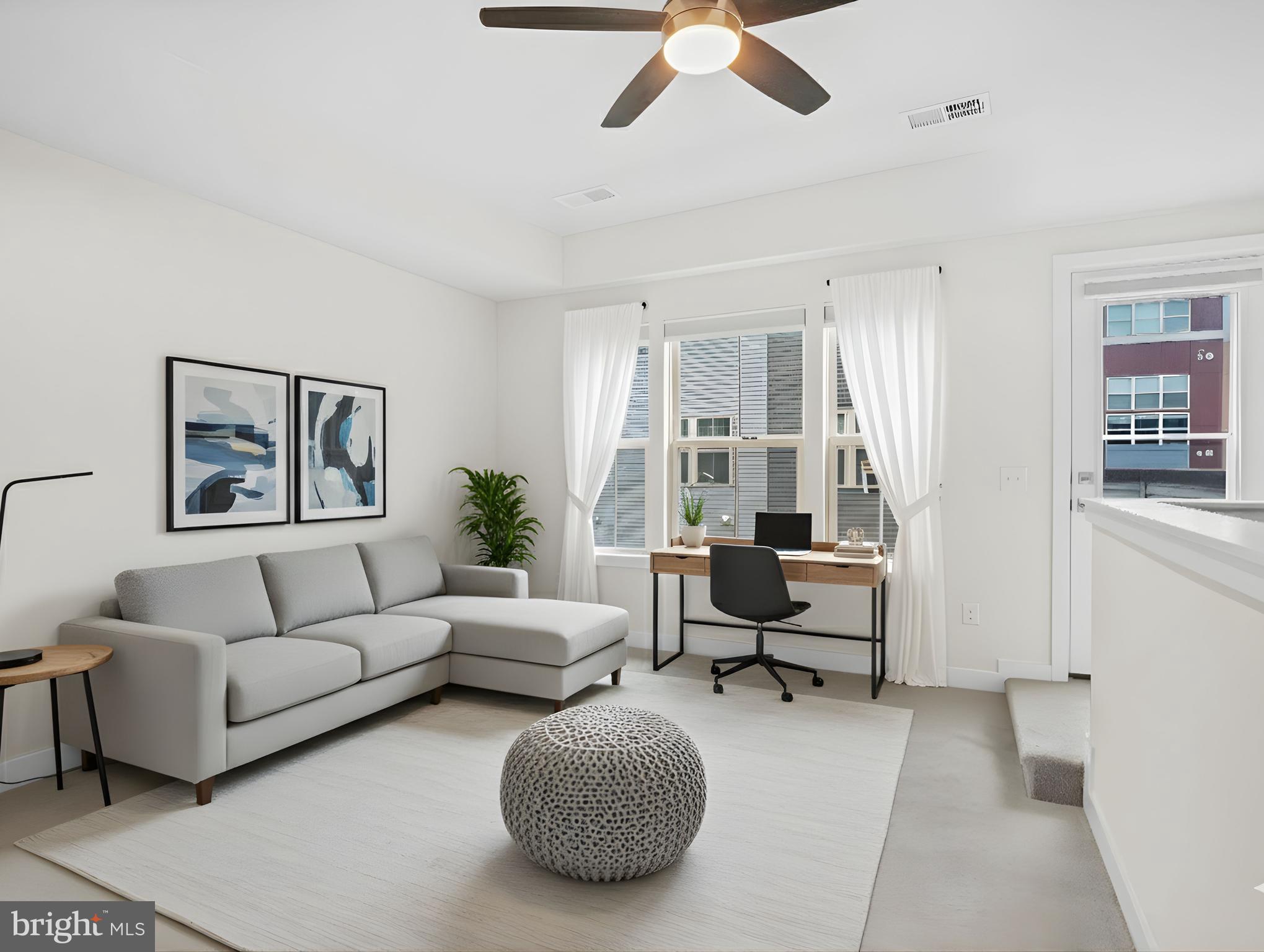 2808 Devonshire Cliffs Terrace Hyattsville, MD 20782 - Photo 14 of 19 a living room with furniture and a large window