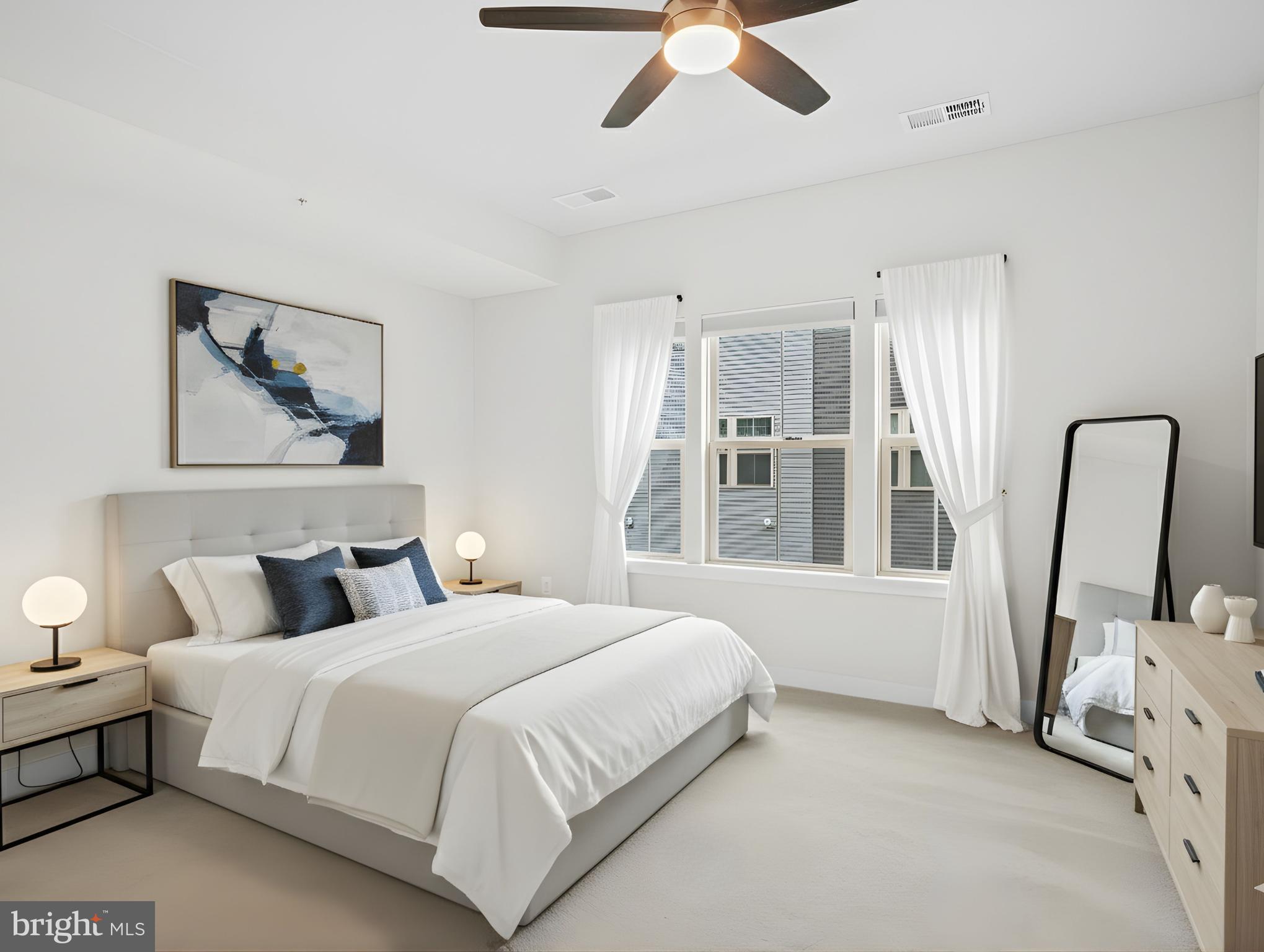 2808 Devonshire Cliffs Terrace Hyattsville, MD 20782 - Photo 4 of 19 a bedroom with a large bed and a window