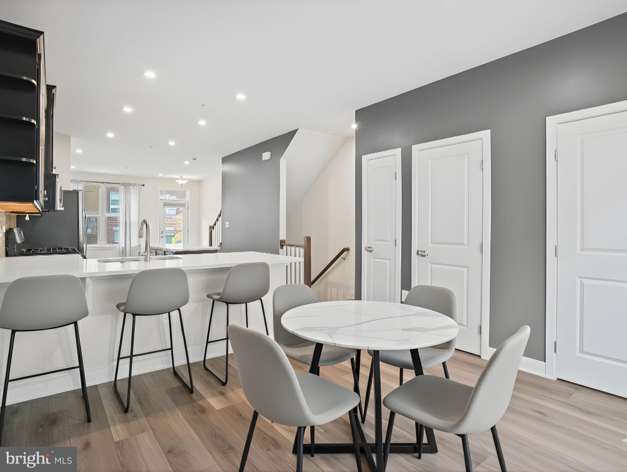 2808 Devonshire Cliffs Terrace Hyattsville, MD 20782 - Photo 8 of 19 a view of a dining room with furniture and wooden floor