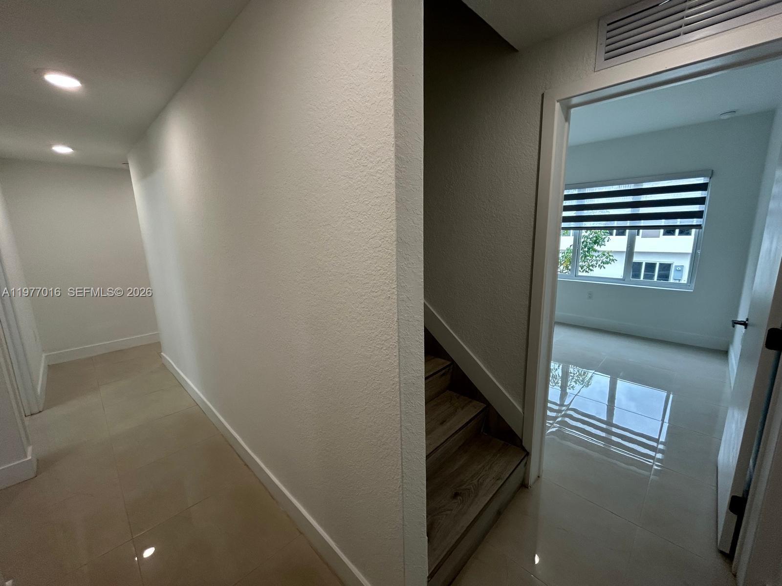 25814 Southwest 144th Court, Unit 2 Homestead, FL 33032 - Photo 13 of 25 a view of an entryway