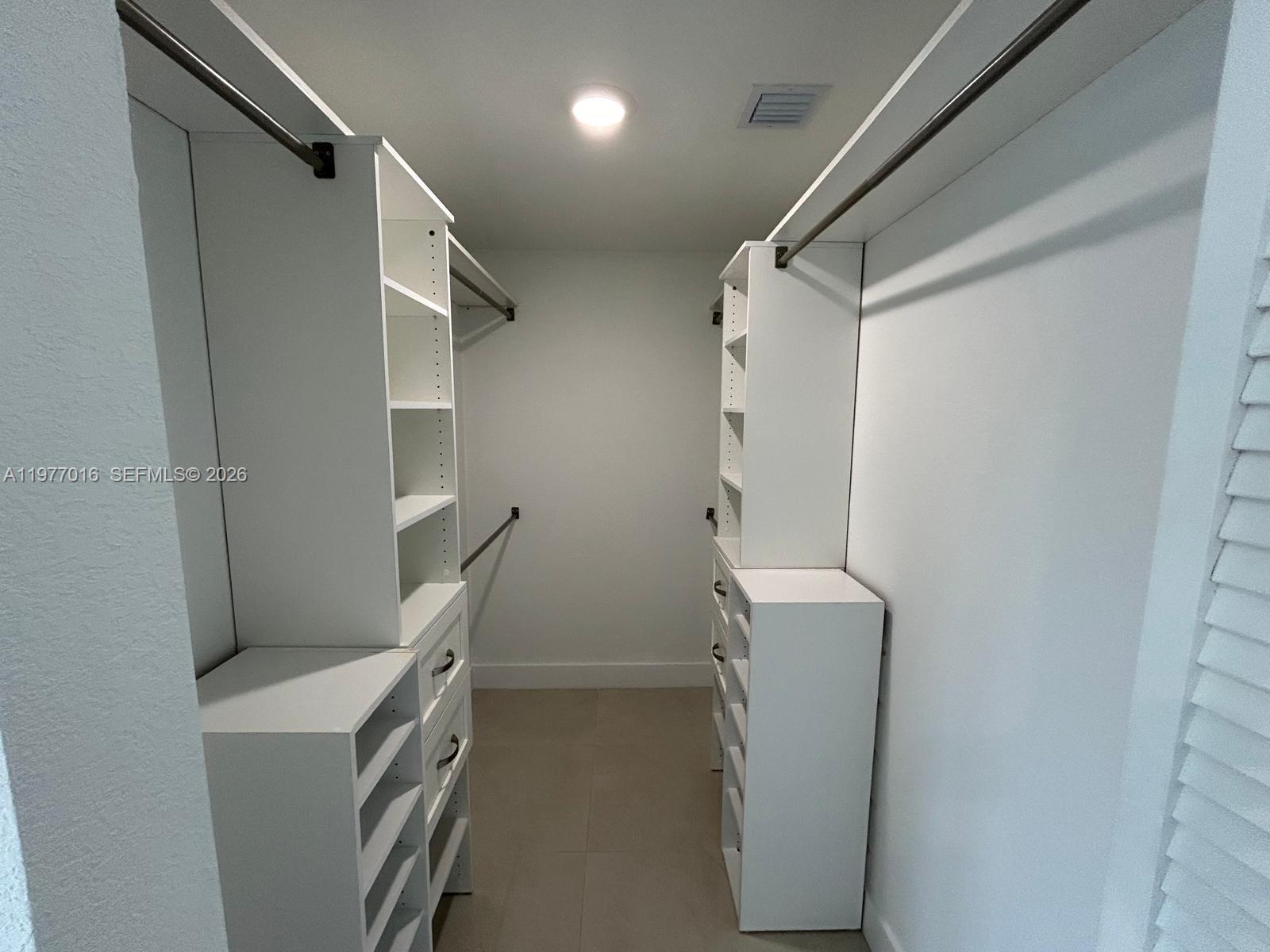 25814 Southwest 144th Court, Unit 2 Homestead, FL 33032 - Photo 18 of 25 a view of an empty room